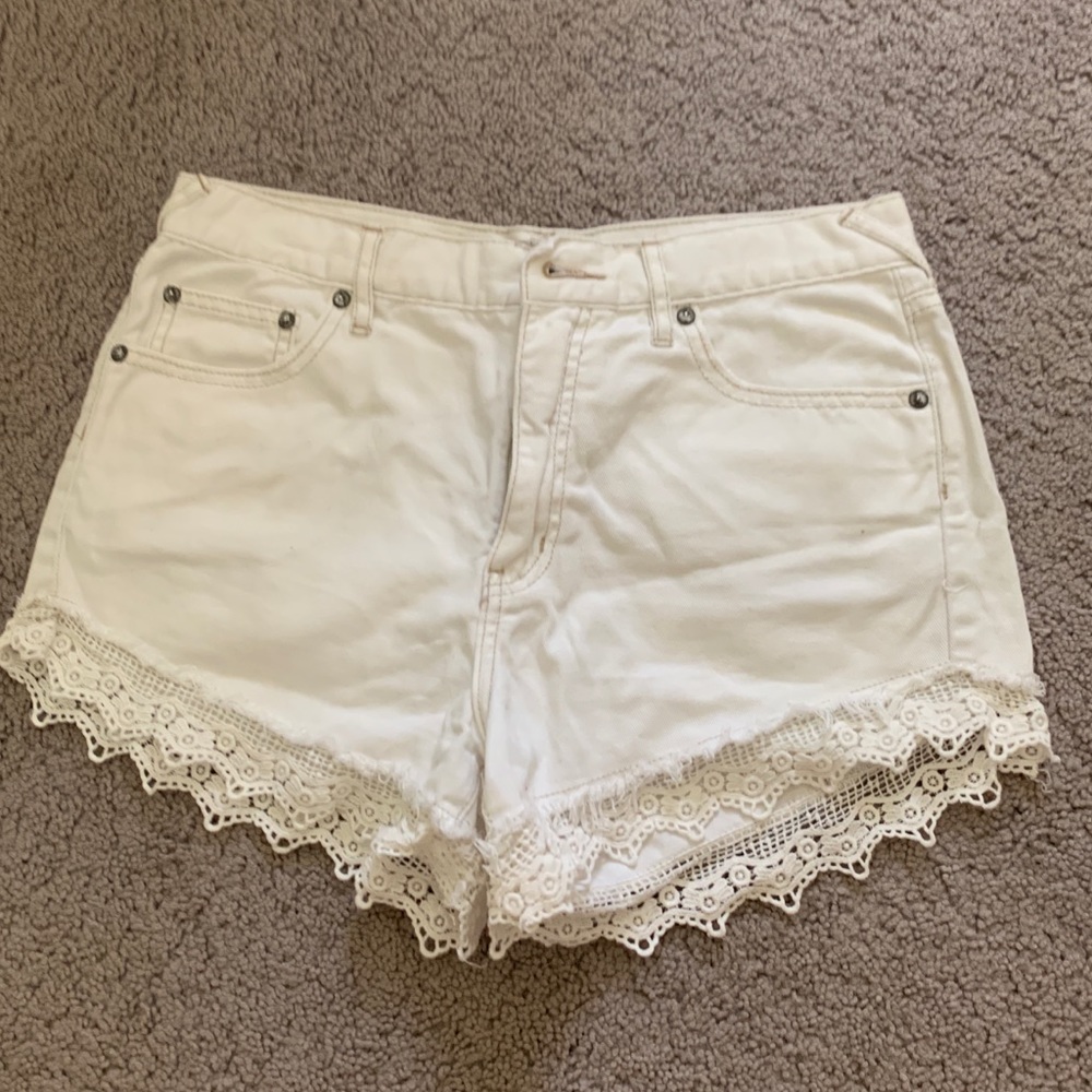 Free People high waisted white jean shorts